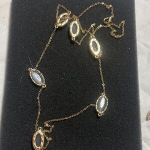 Elegant Gold and White Necklace